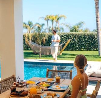 Tingaki Hotel | TAF Beach Villas with Tesla Car and Heated Pool