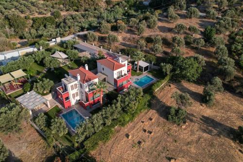 Family Villas Magic Media Resort with Private Heated Pool, Playground, Basketball & Game Room in Rethymno